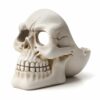 Cool Skull Ashtray in white photographed from the side