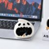 Cute Halloween Ghost Ceramic Ashtray on a laptop