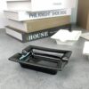 black and white ceramic ashtrays