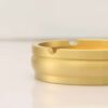 Closeup Photo Brass Metal Ashtray