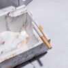 Closeup Photo Of Marble Style Ceramic Ashtray In White
