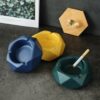 collection of modern ashtrays in green yellow blue
