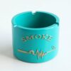 Cyan Blue Ceramic Ashtray With Broken Cigarette Illustration