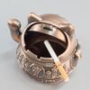 Lucky Cat Ashtray With open Lid and cigarette