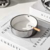 Silver Ceramic Ashtray With Cigarette