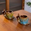 Two Cute Snail Ashtrays Made From Ceramic In Blue And Green Color