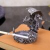 Zinc Alloy Dragon Ashtray On Table With Cigarette
